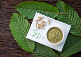 A Picture Of Kratom Powder And Capsules
